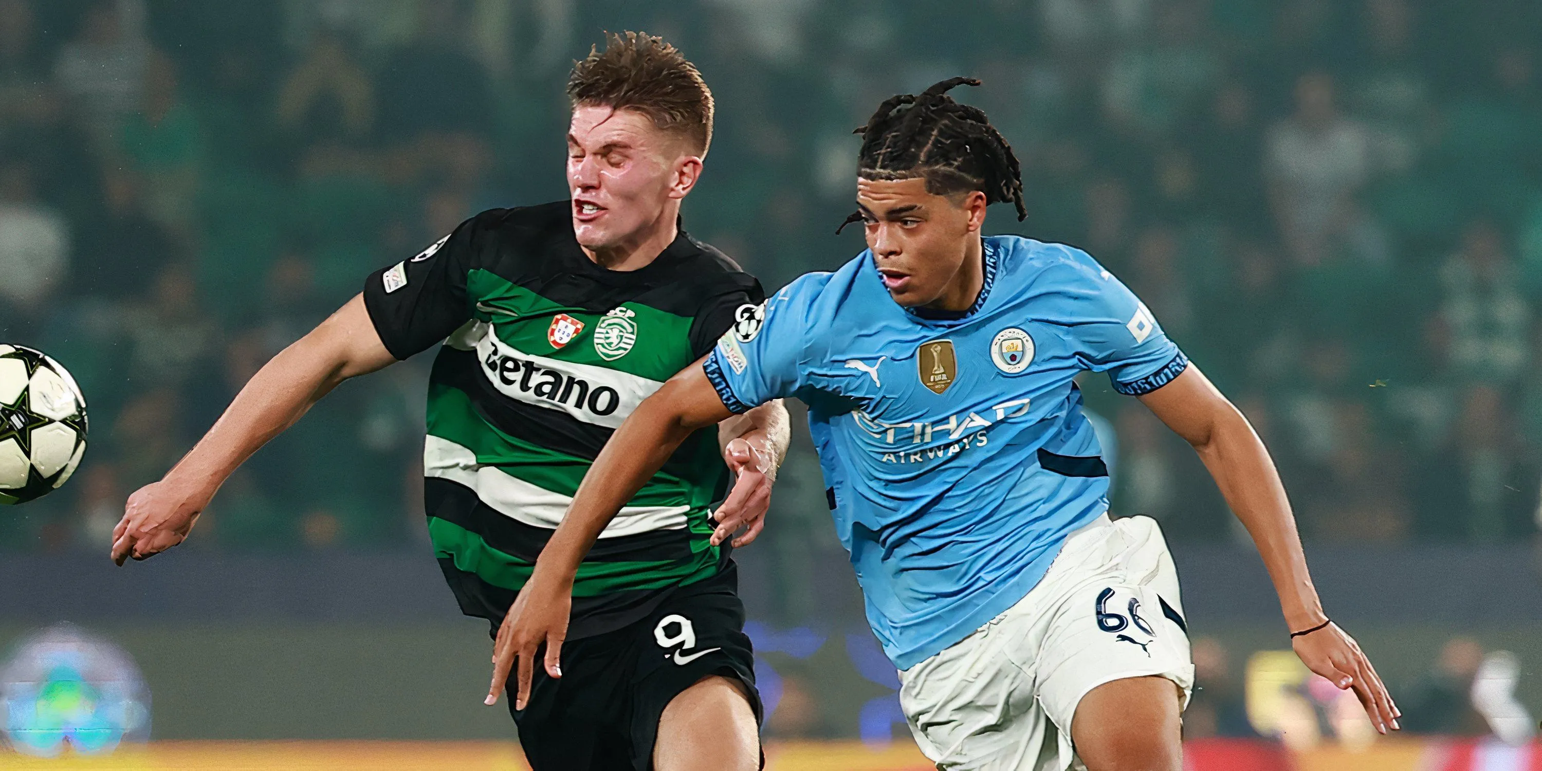 Jahmai Simpson-Pusey của Man City trong pha tranh chấp với Viktor Gyokeres của Sporting Lisbon.